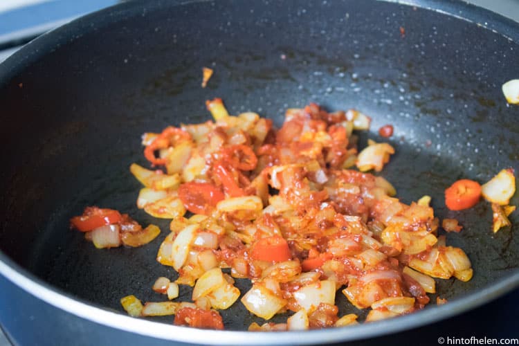 tomato onions and garlic in pan recipe jollof rice