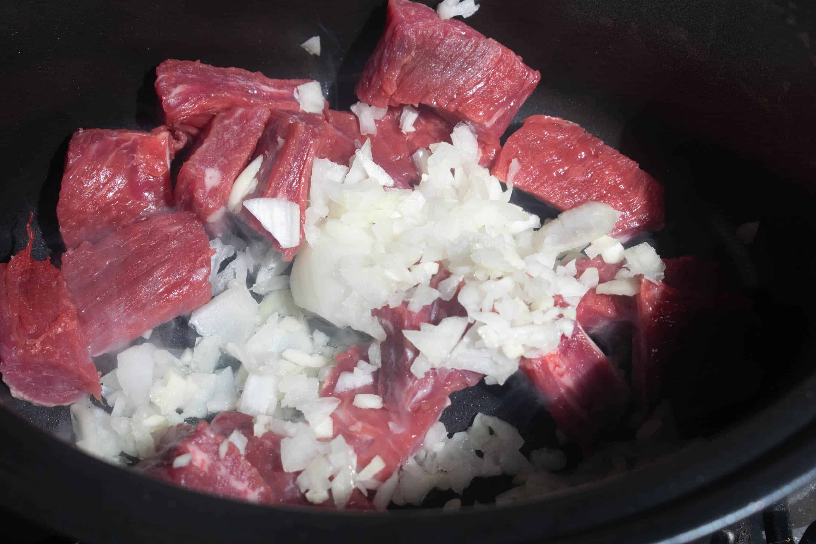 beef and onion in slow cooker