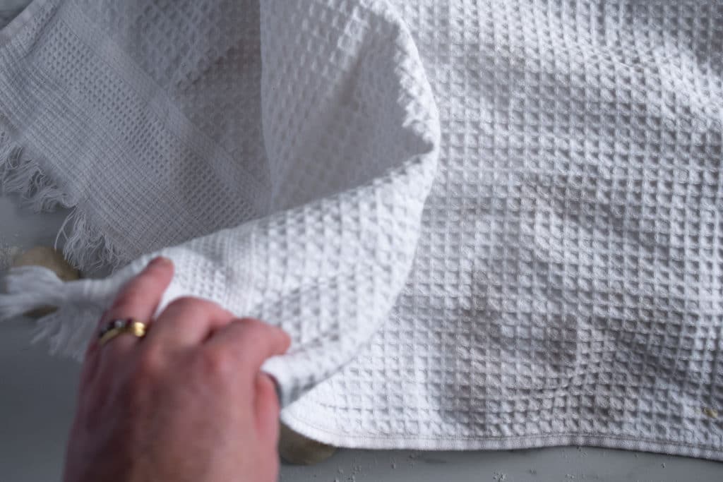 cover dough balls with tea towel