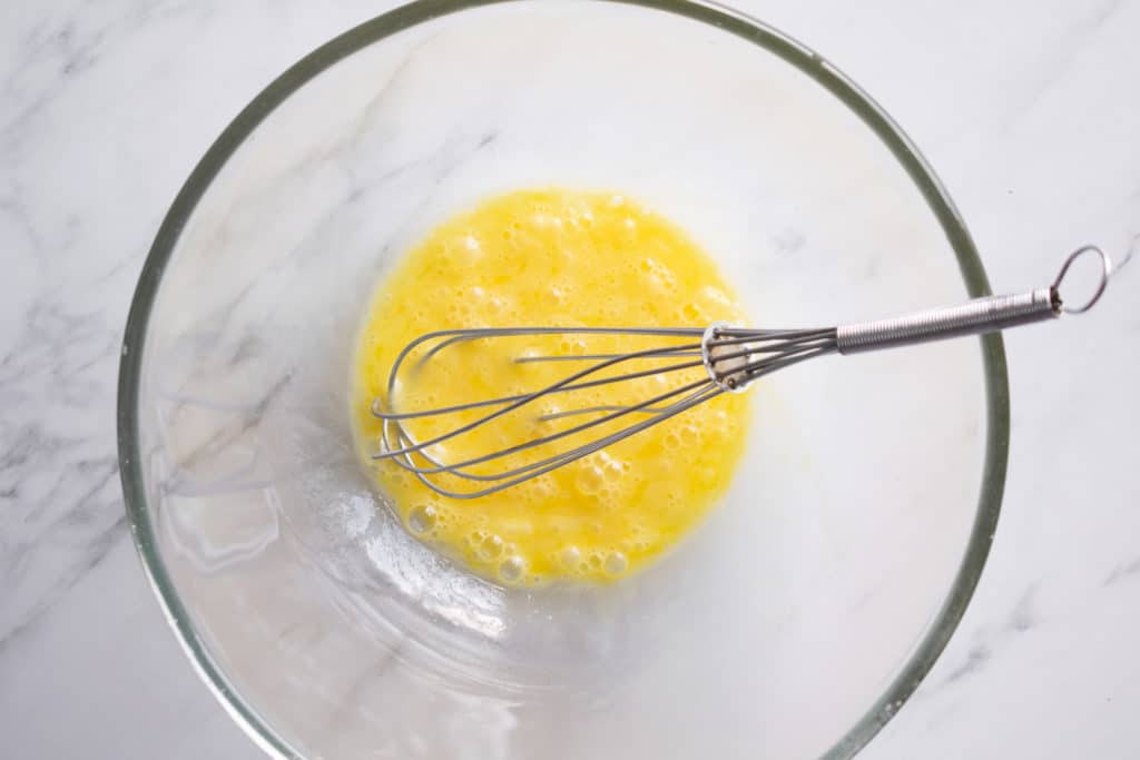 beaten eggs in mixing bowl