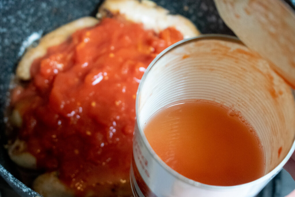 tinned tomato with water