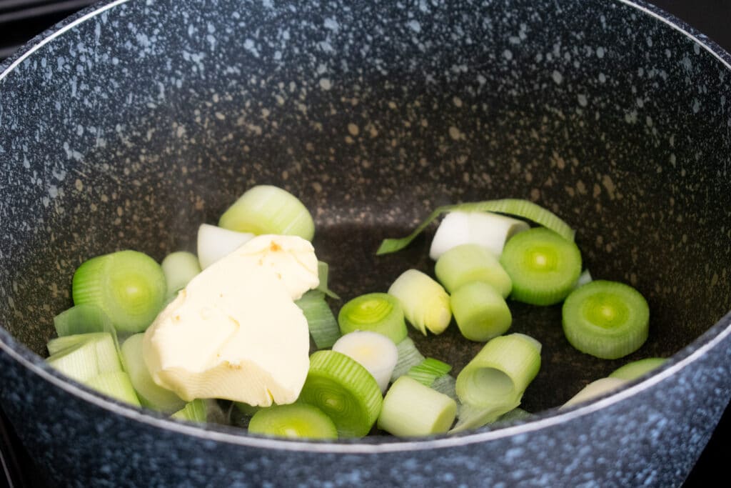 leeks and butter in pan