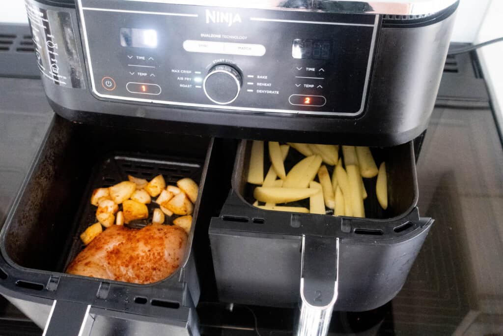 ninja dual air fryer with chicken and veg and chips