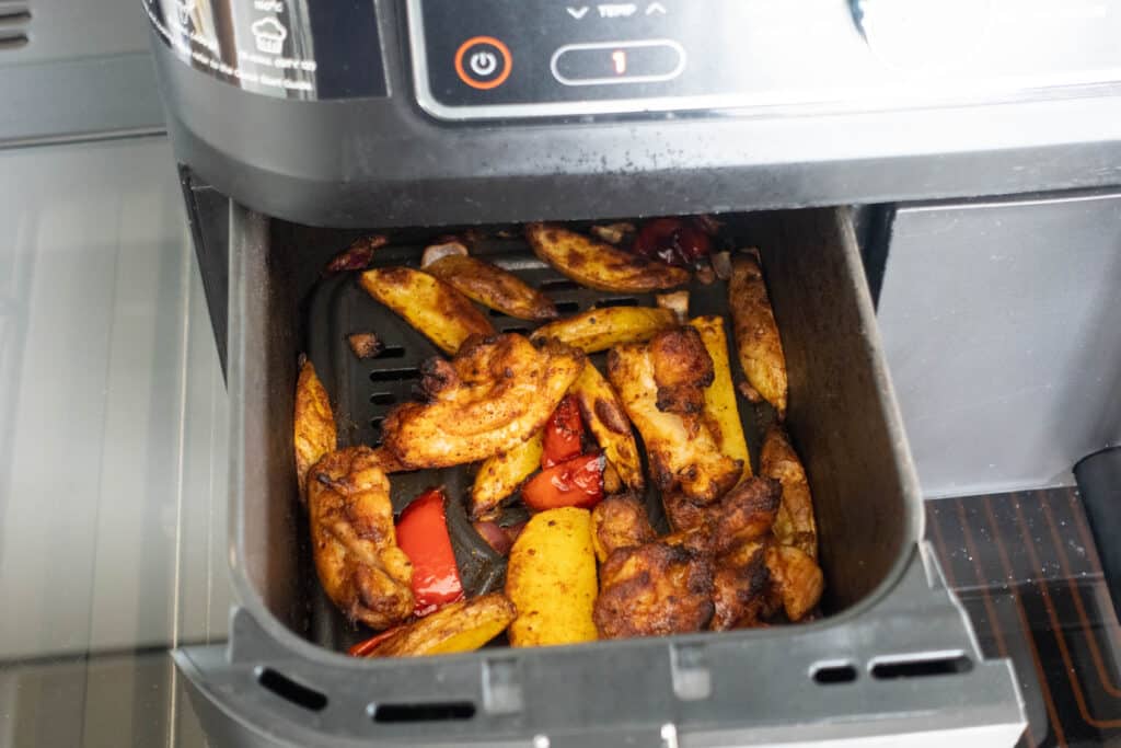 cooked nandos chips with chicken in the air fryer