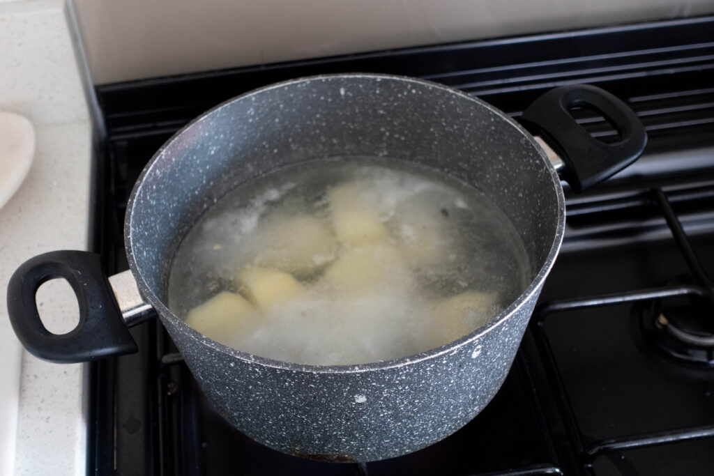 boiling potatoes for roast potatoes