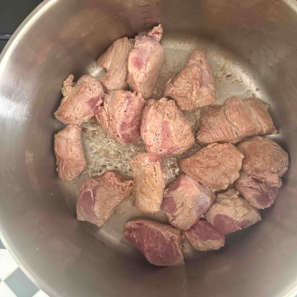 browning pork in pan