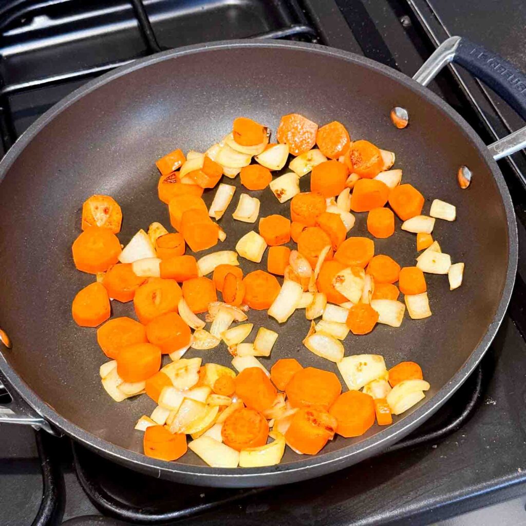 carrots and onion cooking 