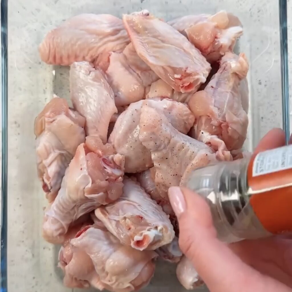 Seasoning the chicken wings